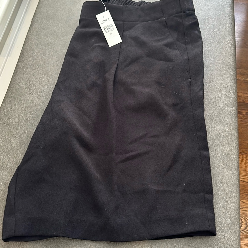 New with tags black polyester shorts